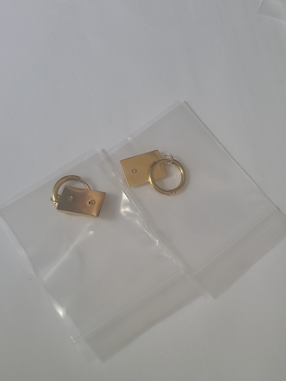 Plunder Gold Tone Cross Charm Hoop Earrings - Picture 3 of 3